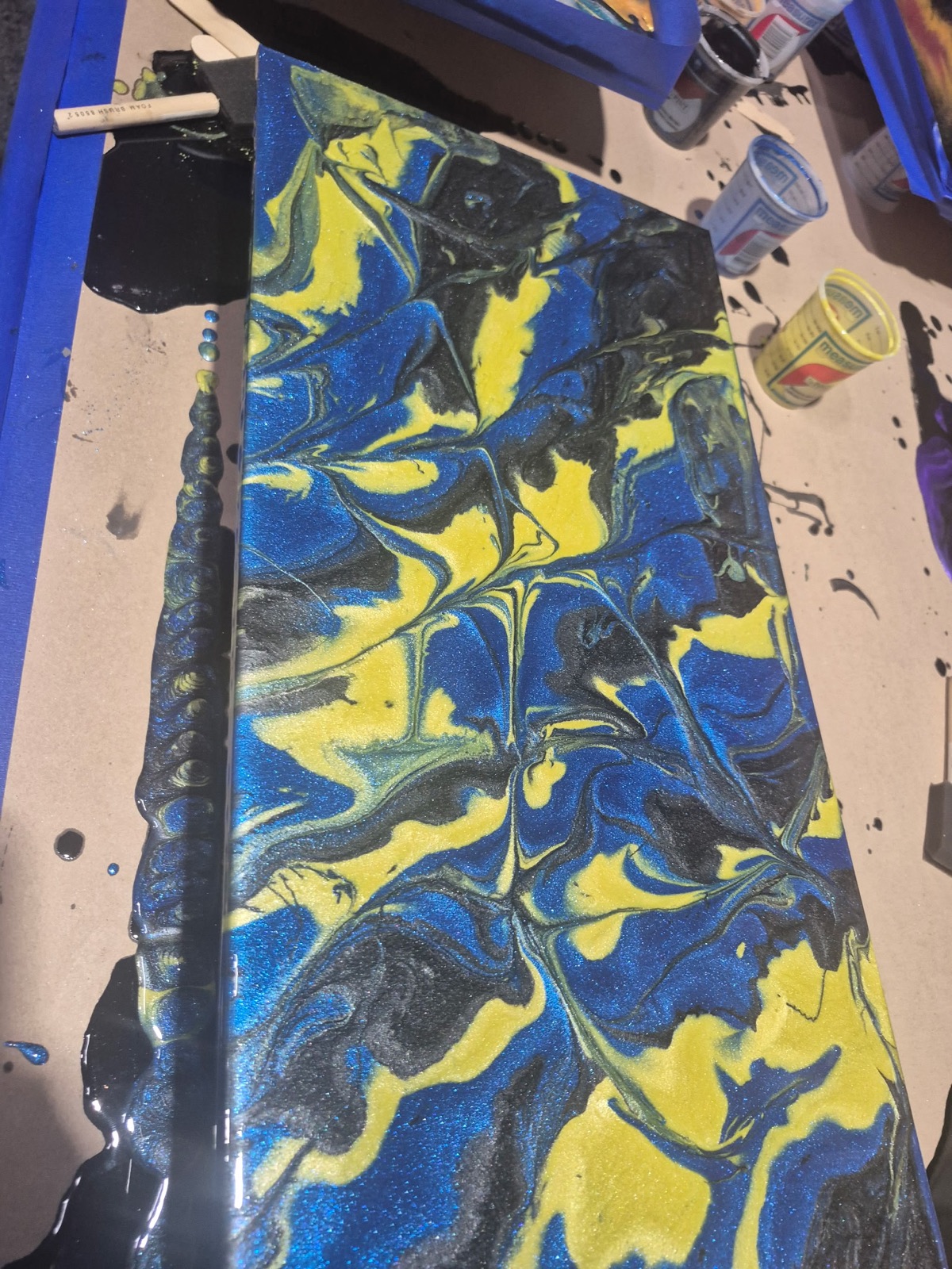 Blue, gold, and black resin slab detail